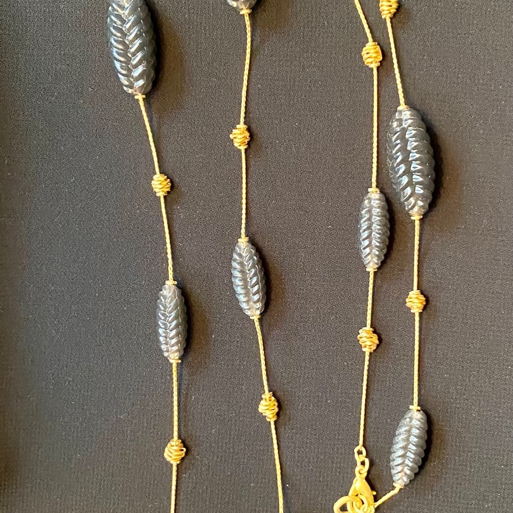 Long cascading faux jade bead and gold necklace